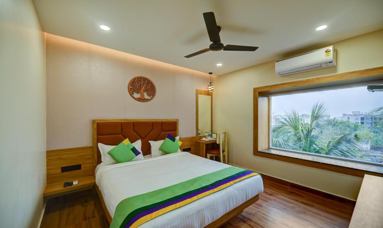 Treebo Aasma Downtown Hotel บูบันเนสชวาร์ ภายนอก รูปภาพ